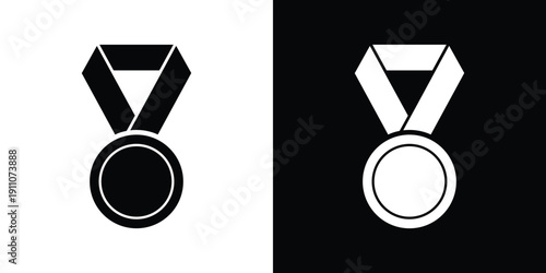 Black and white medal with ribbon on contrasting backgrounds