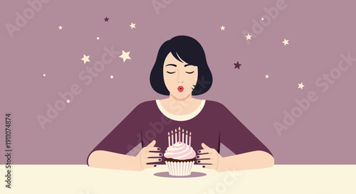 Woman Blowing Out Candles On A Birthday Cupcake