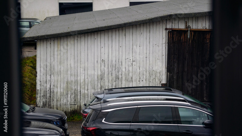 Photos Used car sales parking lot with row of second-hand vehicles