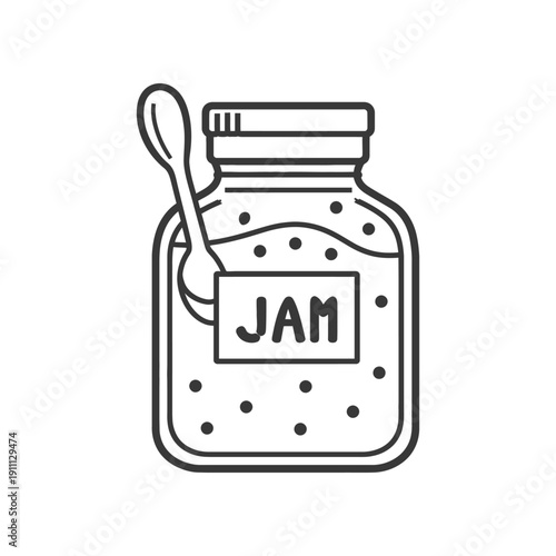 A jar of fruit jam with a spoon leaning against its side