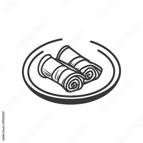 Two spring rolls displayed on a simple black and white plate