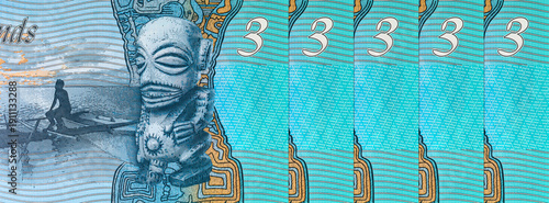 3 Dollars Banknote of the Cook Islands with the image of Carving of Tangaroa (God of the sea) and a man and his canoe . Polymer money of the Cook Islands