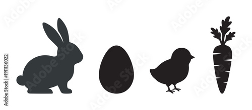 Set of four black Easter silhouettes featuring a bunny, egg, chick, and carrot in a minimalist graphic style for seasonal holiday celebration and spring themes