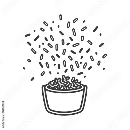 A bucket overflowing with sprinkles falling into the open container