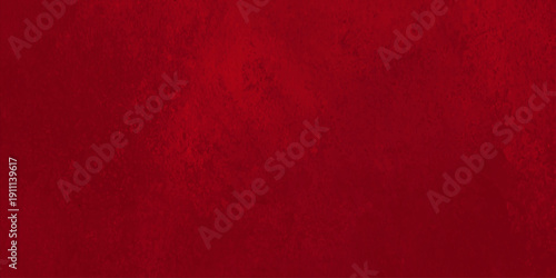Vibrant red grunge texture background with dark mottled patterns, aged crimson paint effect, and abstract weathered wall