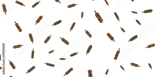 Aerial view of scattered multicolored bullet casings on white surface