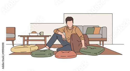 Relaxed Man Sitting On Floor Surrounded By Floor Cushions Indoors Minimalist Style
