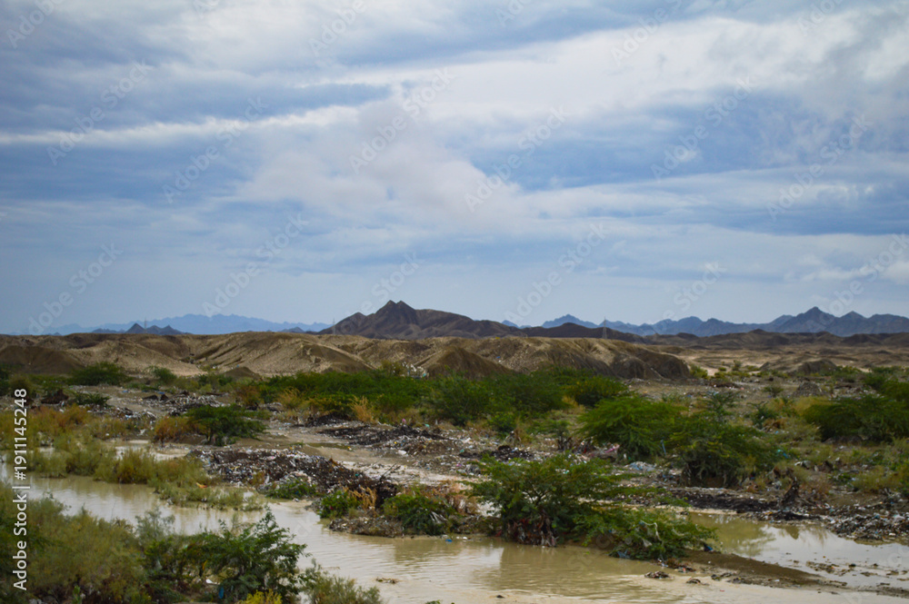 Fototapeta premium river in the mountains clouds over sky nature rainy season