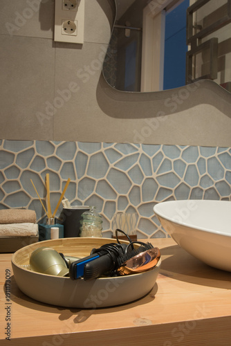 Modern domestic bathroom with hair tools