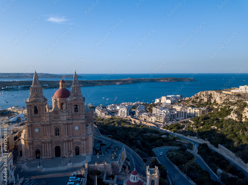 Obraz premium Aerial View of Mellieħa with Church and Town, Malta