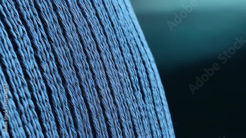 Macro-view: Textured surface in shades of blue, the image showcases the detailed pattern with its elegant lines. 