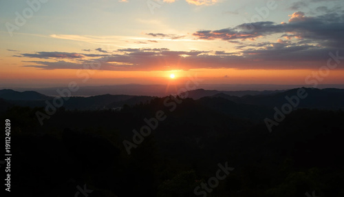 Golden evening above jungle hills