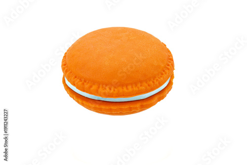 Cookie-shaped eraser. Macaron cookie isolated on white background. Eraser macaroon cookie.