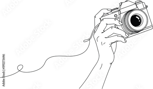 Hand holding a vintage camera with a trailing cord illustration
