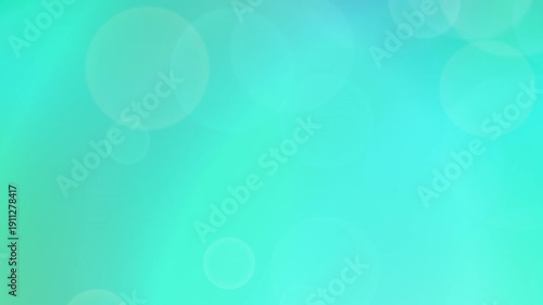 Vibrant green and blue bokeh background with dynamic light effects