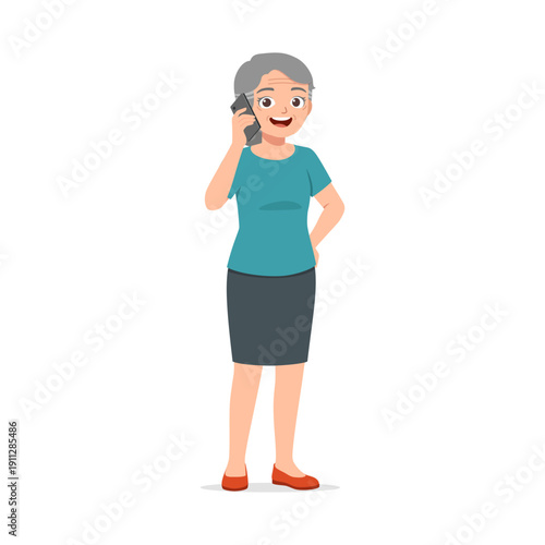 Happy smiling Asian senior woman talking on a mobile phone in a teal shirt and grey skirt