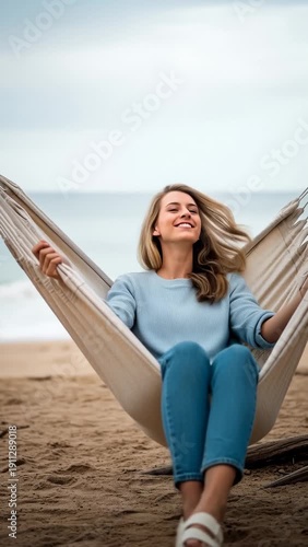 Wallpaper Mural Smiling Woman Relaxing in a Hammock on the Beach With Ocean in the Background Torontodigital.ca