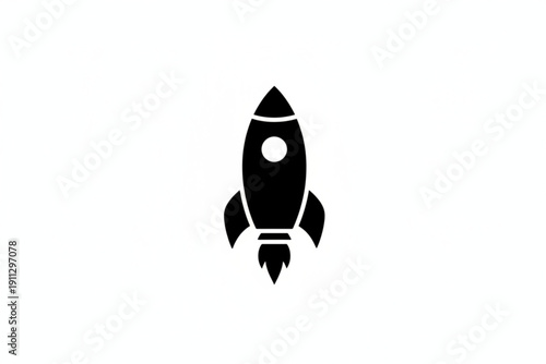 Rocket in Silhouette: A sleek, black silhouette of a rocket, poised for ascent against a minimalist backdrop, evokes themes of progress, innovation, and aspiration.