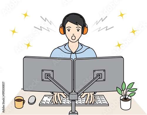 イヤーマフで静かな環境を作りプログラミングに集中する男性