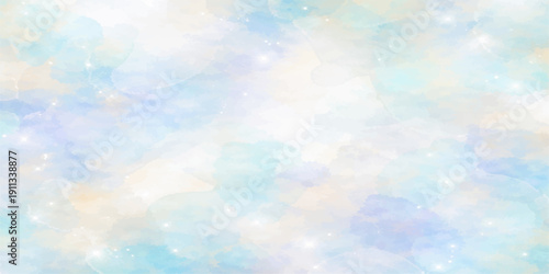 Beautiful abstract blue bokeh background featuring bright white clouds in a clear sunny summer sky with natural sunlight and atmosphere