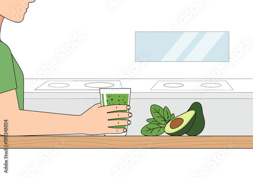 Person holding a green smoothie with spinach and avocado nearby on a kitchen counter preparing a healthy beverage