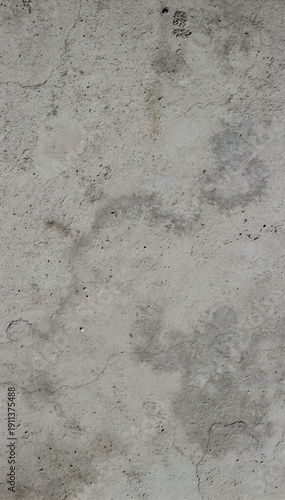 Neutral concrete wall texture background with subtle grain and soft light, minimalist industrial cement surface backdrop with copy space for business, construction and modern design
