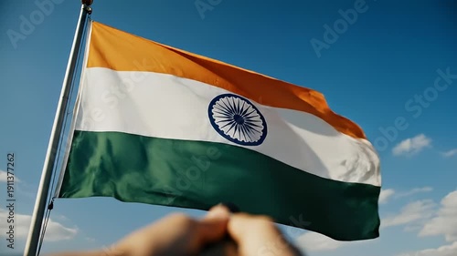 India flag waves in bright blue sky video.