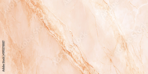 A close up view of a textured light peach and cream colored marble surface with subtle veining patterns