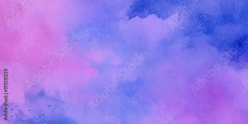 A beautiful abstract watercolor background with blended shades of pink purple and blue creates a soft dreamy texture