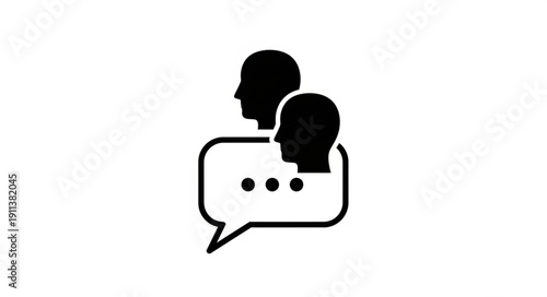 Two Silhouetted Heads in a Speech Bubble Icon Representing Communication.