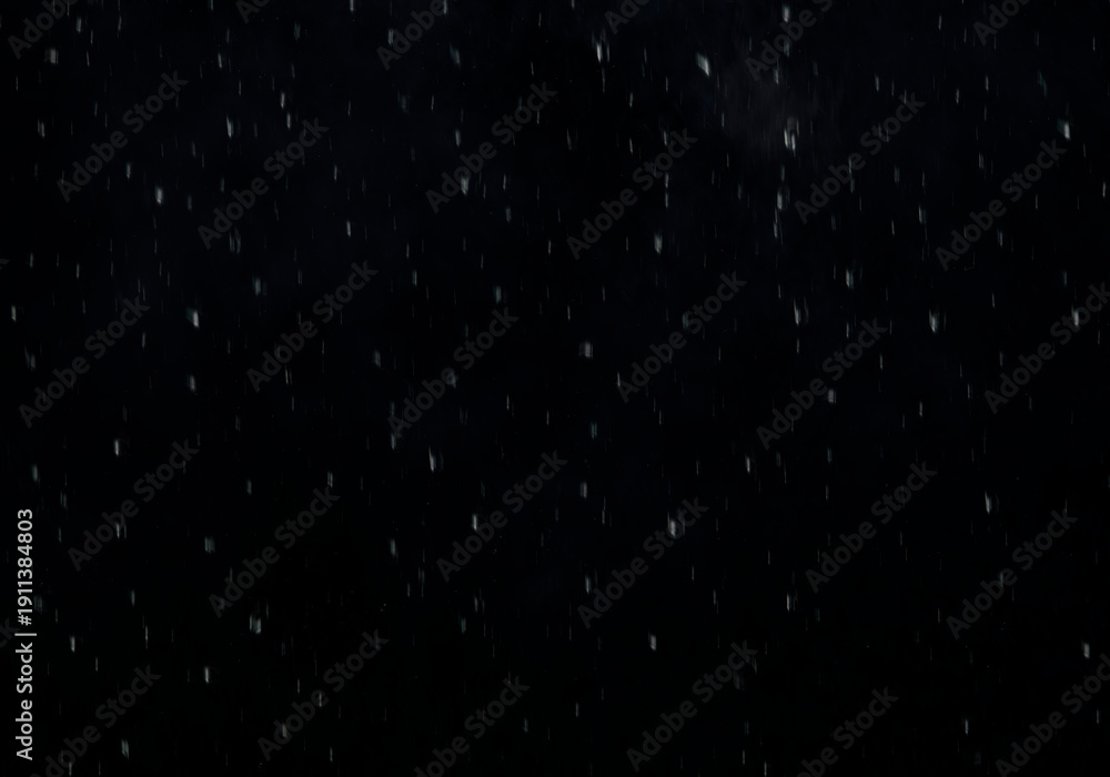 Obraz premium Distant silver specks floating across deep indigo expanse, haze hinting at faraway clouds, atmospheric texture for cosmic themed visuals high