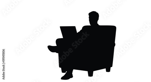 Man seated in armchair using laptop distinct black silhouette