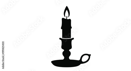 A black candle with a burning flame presented as a silhouette