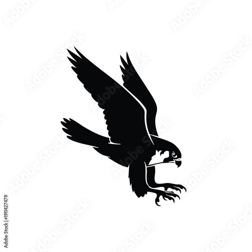 Silhouette of a Peregrine Falcon in midflight with wings spread.