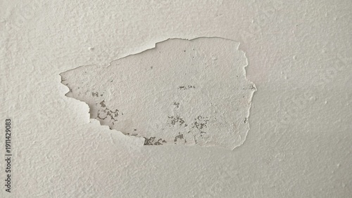 Fotografie The surface or background of an old white wall with peeling paint
