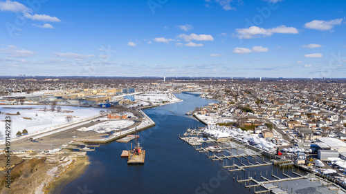 Bilde på lerret Aerial view of the oceanside waterway and a winter marina with empty boat slips,