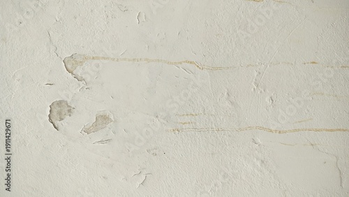 Foto The surface or background of an old white wall with peeling paint