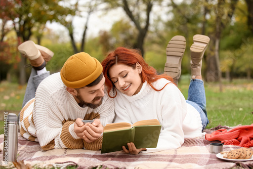 Cute young couple in warm s...