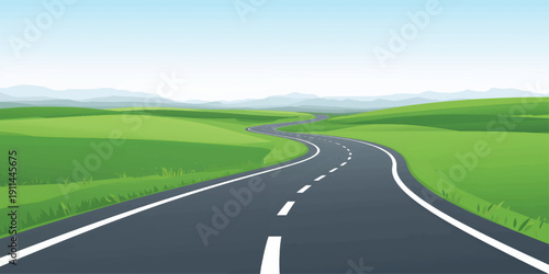 Mountain road through green countryside under clear summer sky