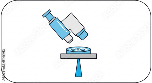 Microscope examines sample on stage in laboratory setting for scientific research and analysis