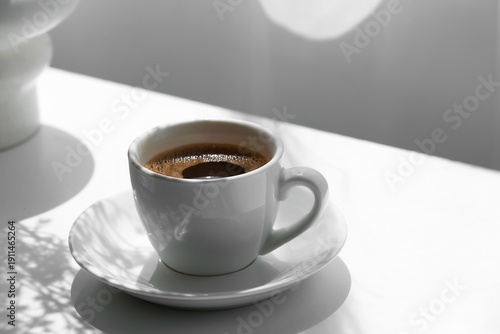Cup of hot coffee on white ...