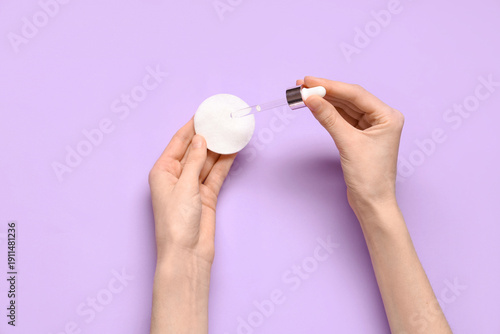 Female hands holding cotton...