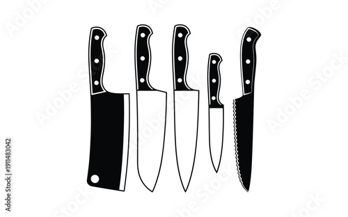 A Collection of Kitchen Knives: Cleaver, Chef's, Paring, and Serrated Knives