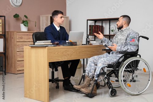 Male lawyer working with so...