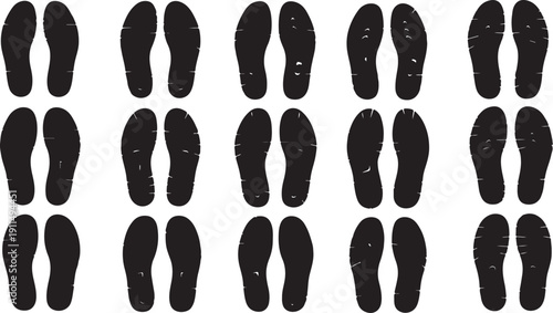 Collection of various black shoe soles on white background