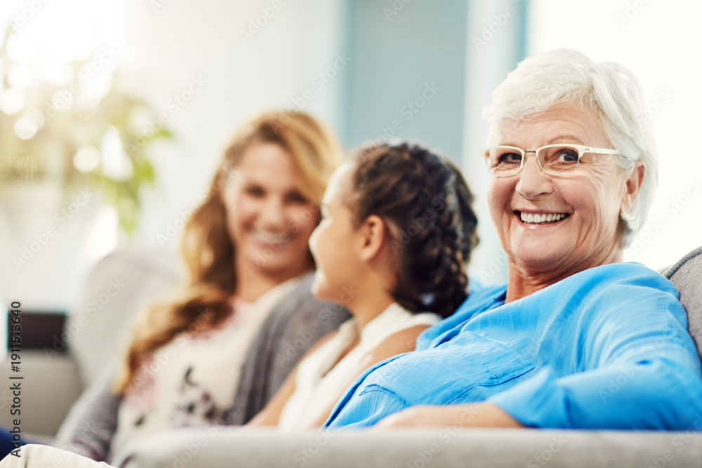 Fototapeta premium Portrait, grandmother and mom on sofa with child, connection and bonding together on weekend break. Old woman, mother and daughter in family home with generations, smile and relax for retirement.