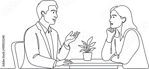 Businessman and woman in modern office discussing ideas