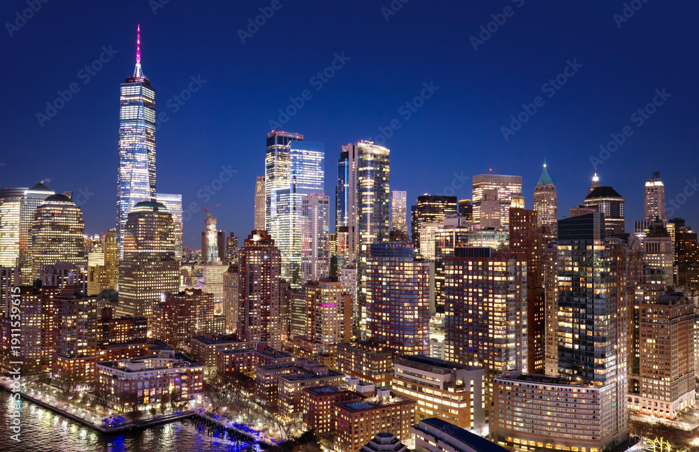 Obraz premium Manhattan skyline. New York City wide panoramic skyline. New York cityscape along the waterfront. NYC aerial skyline above downtown Manhattan. New York City landscape with skyscrapers.