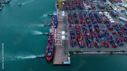 Wallpaper Mural Time lapse Tug boat pulling Cargo container ship go to international yard port. technology freight shipping with smart port.cargo ship carrying container and running for export cargo yard port Torontodigital.ca
