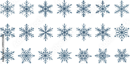 A collection of blue snowflakes arranged in a grid pattern on a white background viewed from directly above